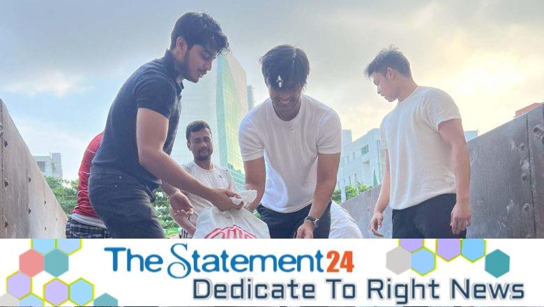 ISD students stand by flood-affected people